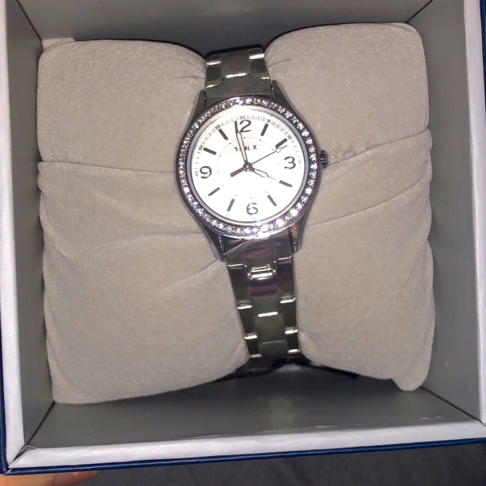 Women’s silver Timex watch.